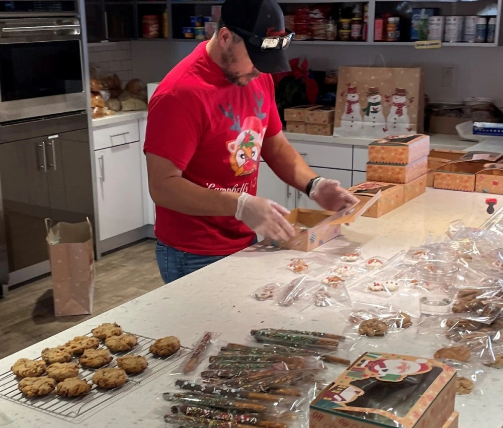 baker preparing a large quantity of baked goods for our houseguests