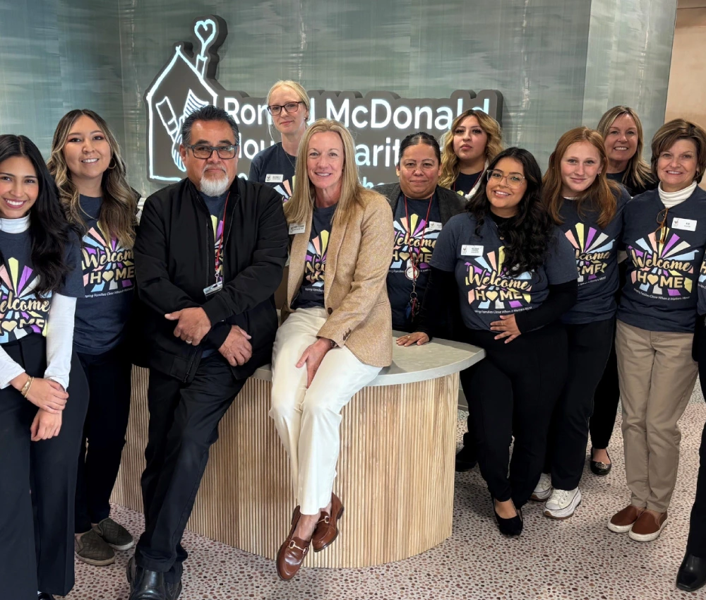 cambridge house staff gathered in matching shirts for house re-opening