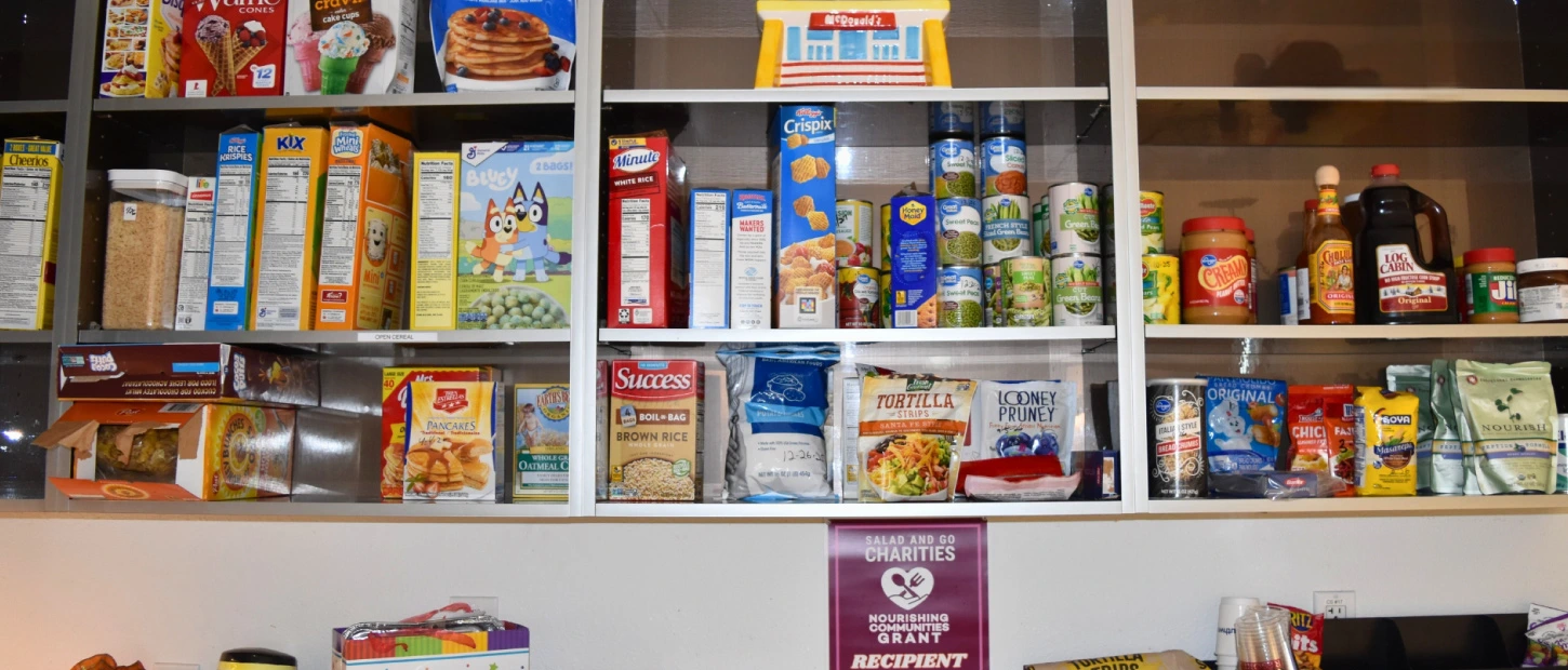 Pantry stocked with food goods for our houseguests